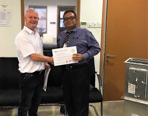 Darren Webster presents certificate