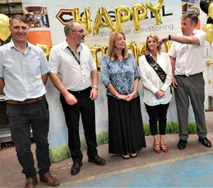team and linda at retirement event